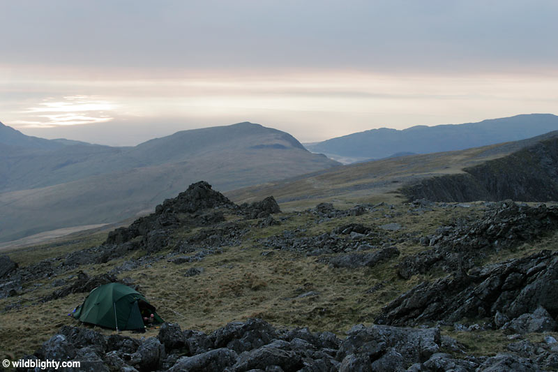 Wild Camping on Cadair Idris close to its summit with views of the Irish Sea