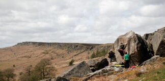 Climbers Bouldering at Stanage Plantation