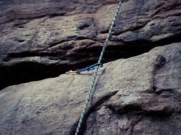 A climbing rope on bolted route