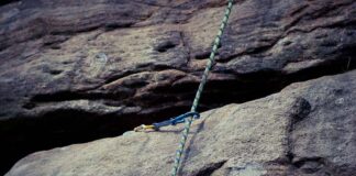 A climbing rope on bolted route