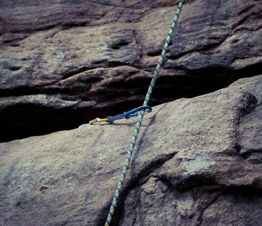 A climbing rope on bolted route