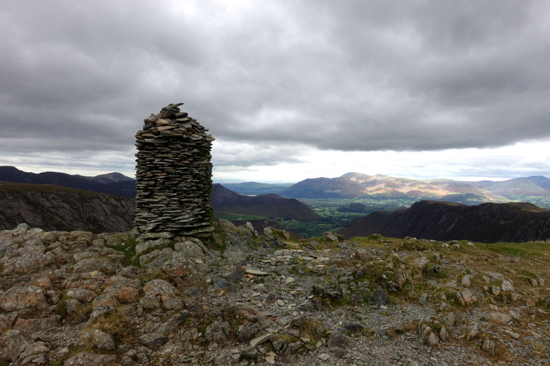 Dale Head Summit Cairn and distant mountain views