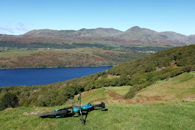 Mountain Bike with view of Coniston Water and fells.