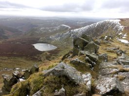 Wintry view of Llyn Lluncaws from Cadair Berwyn