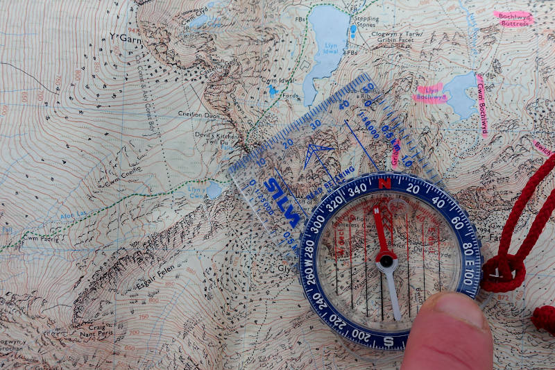 Taking a bearing with compass and map